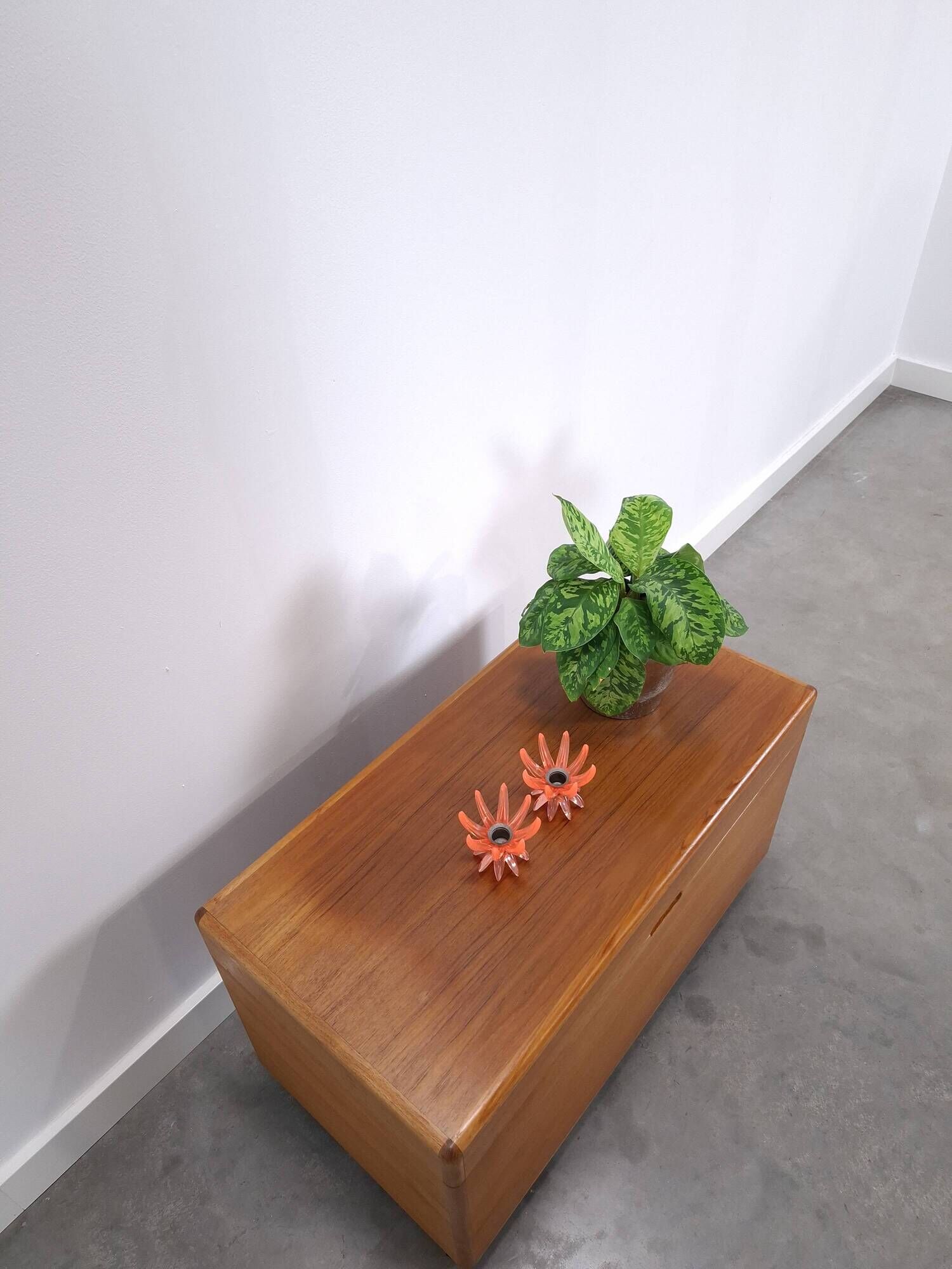 Vintage teak Danish chest with a lid on wheels, toy chest.