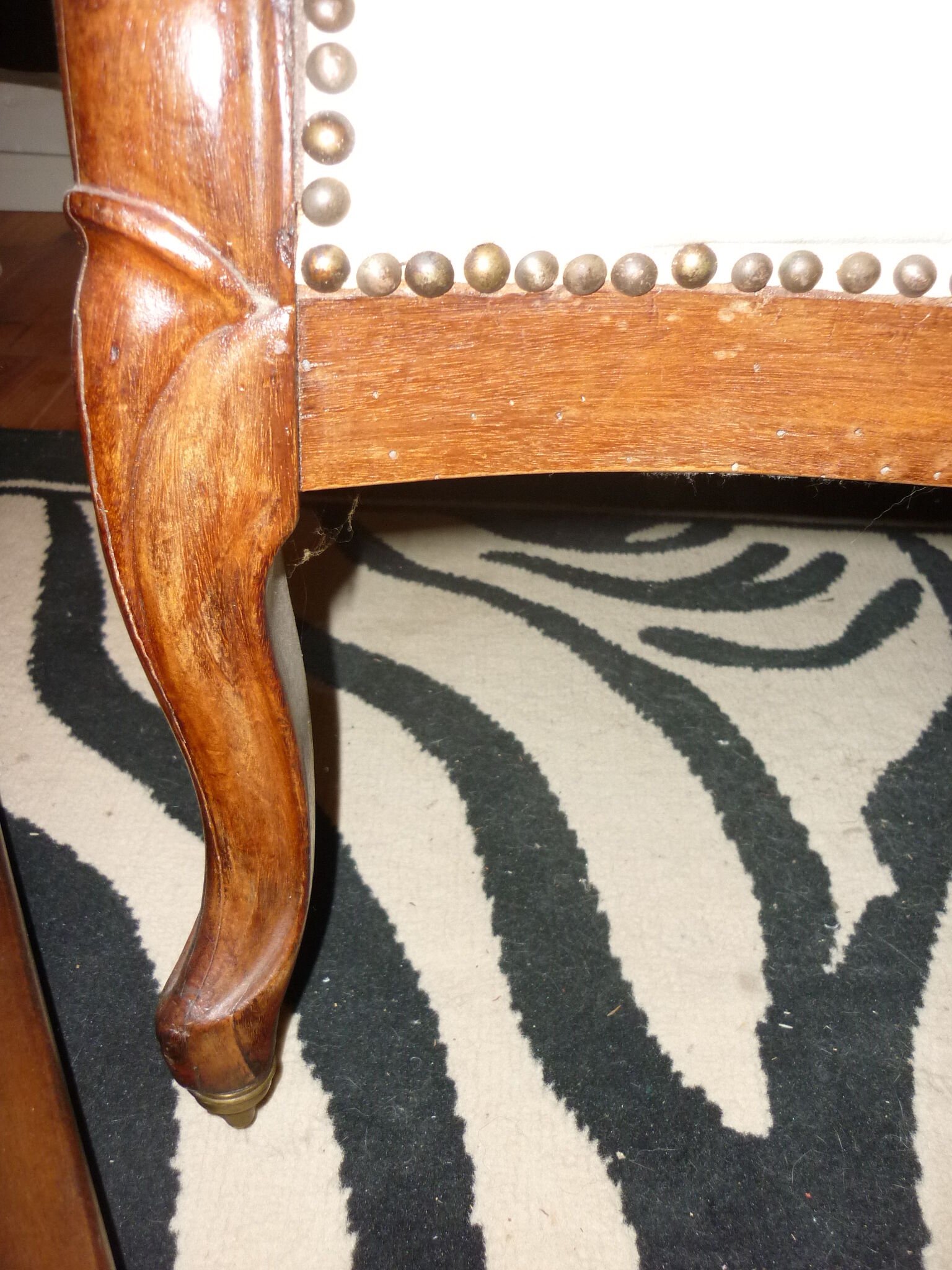 Armchair and its footrest