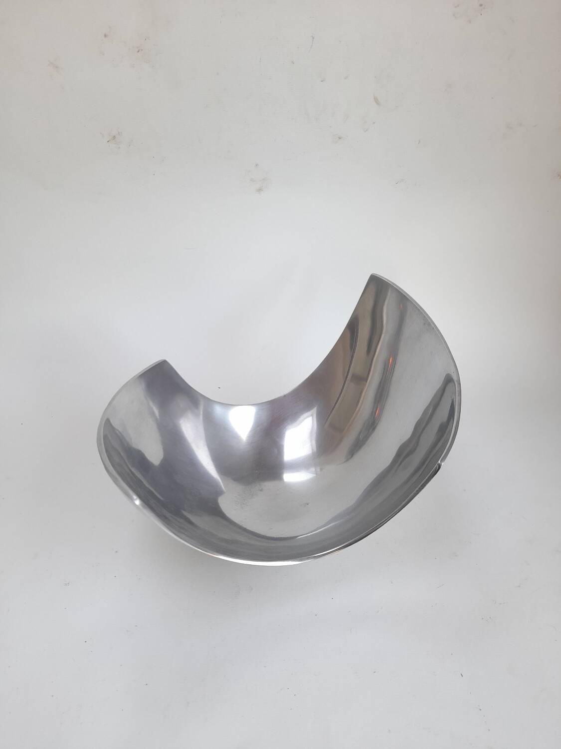 Asymmetrical aluminium fruit dish from the 90s.