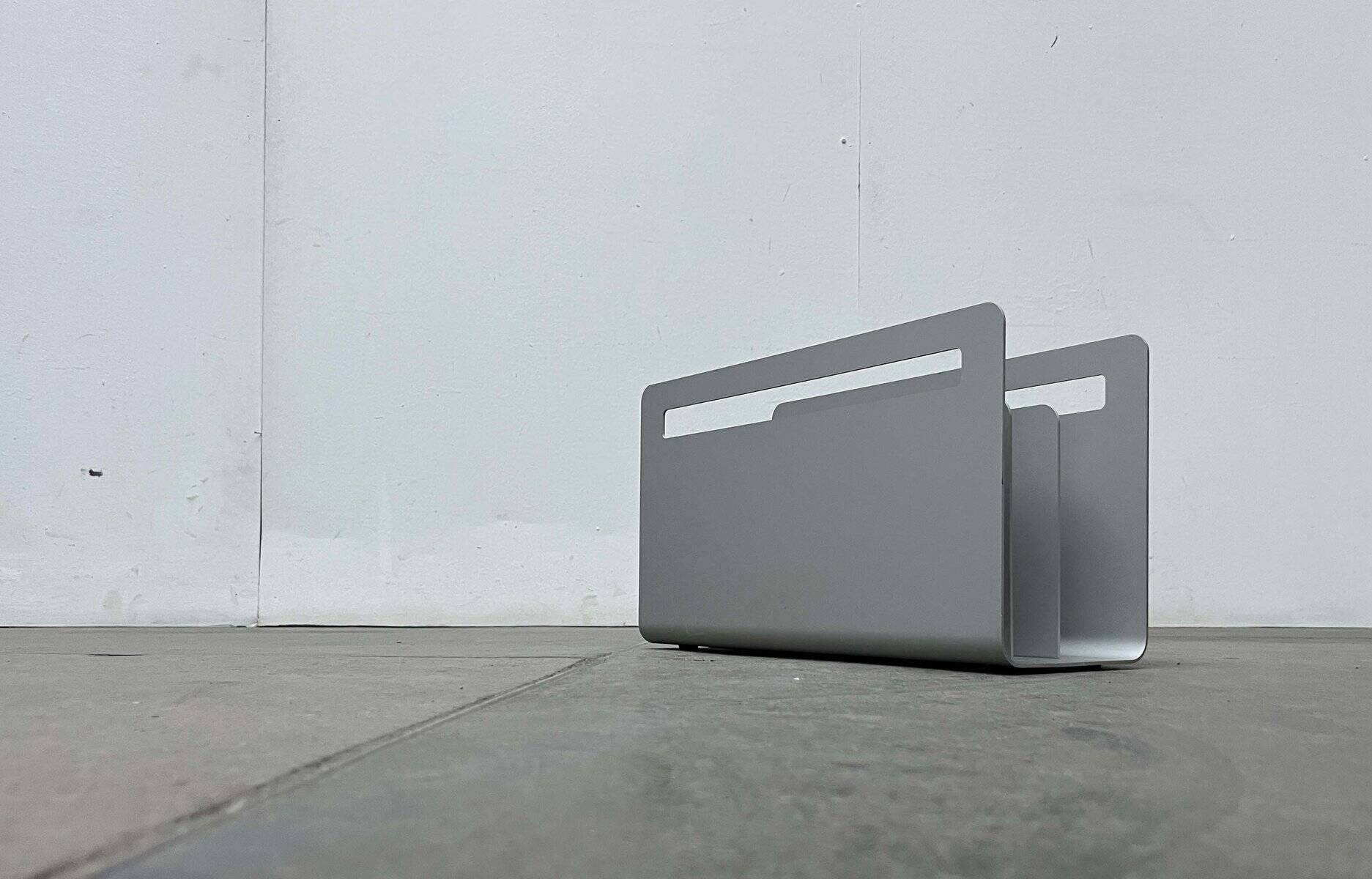 Minimalist aluminium magazine rack by Norman Foster for Helit, Germany, 1990s.