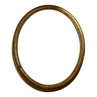 Old oval shaped wooden frame