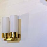 Set of three brass and opaline sconces, mid-century France