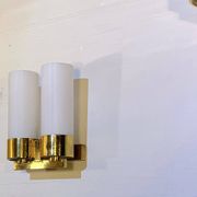 Set of three brass and opaline sconces, mid-century France