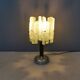 Table lamp with a teak ‘trunk’, silver-coloured metal base, acrylic shade