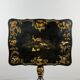 Table pliante Napoléon III en bois laqué noir et décor doré, XIXe siècle