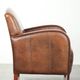 Sheepskin armchair in Art Deco style with wooden armrests