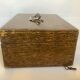Old wooden box with handle and metal keys