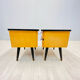A pair of night cabinets