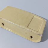 Pale yellow ceramic soap dish