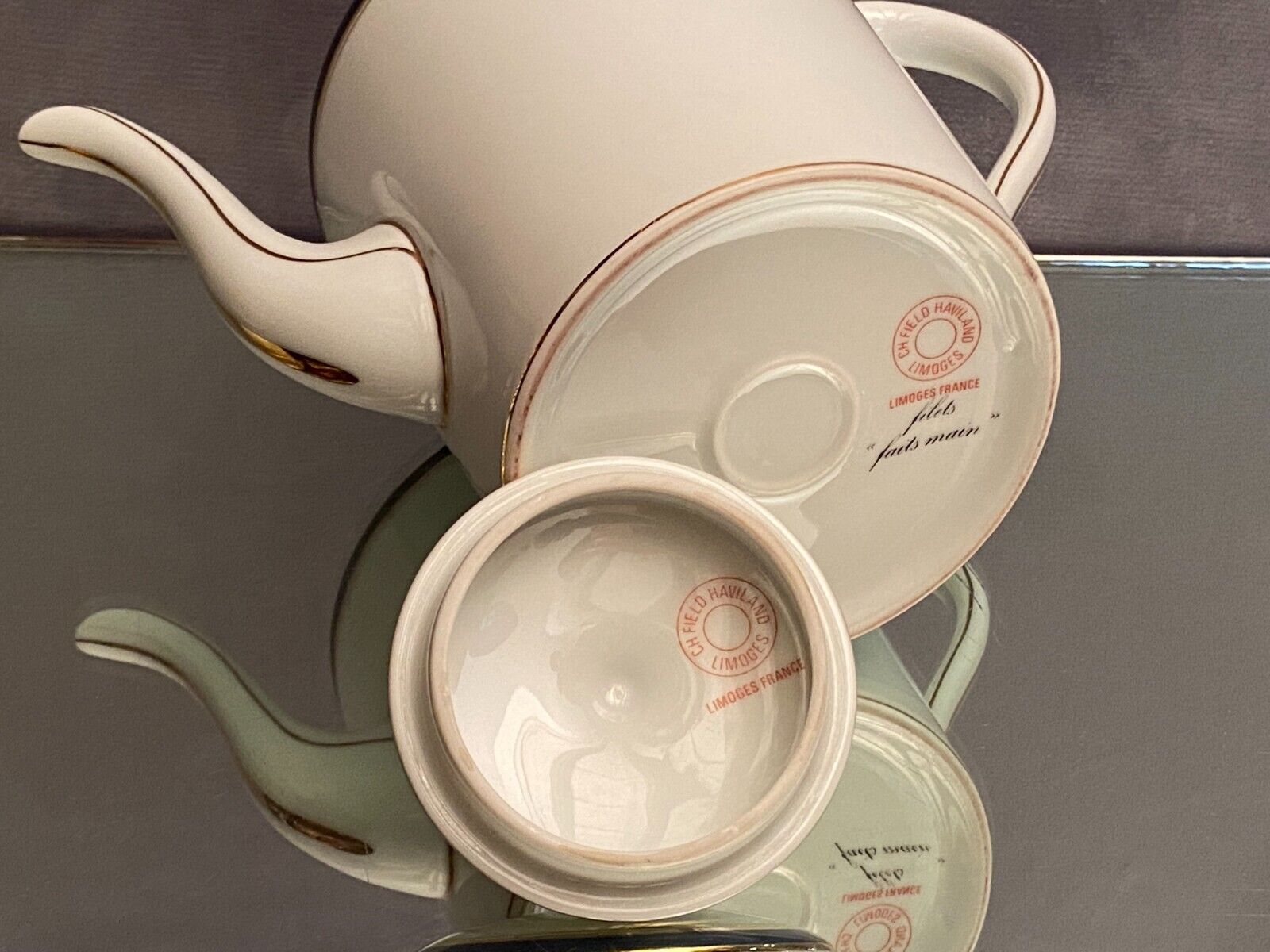 Teapot with blue and gold nets in Limoges porcelain signed Haviland