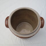 Old butter jug in flaming sandies