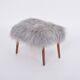 Danish Mid-century Modern stool reupholstered in grey sheep skin