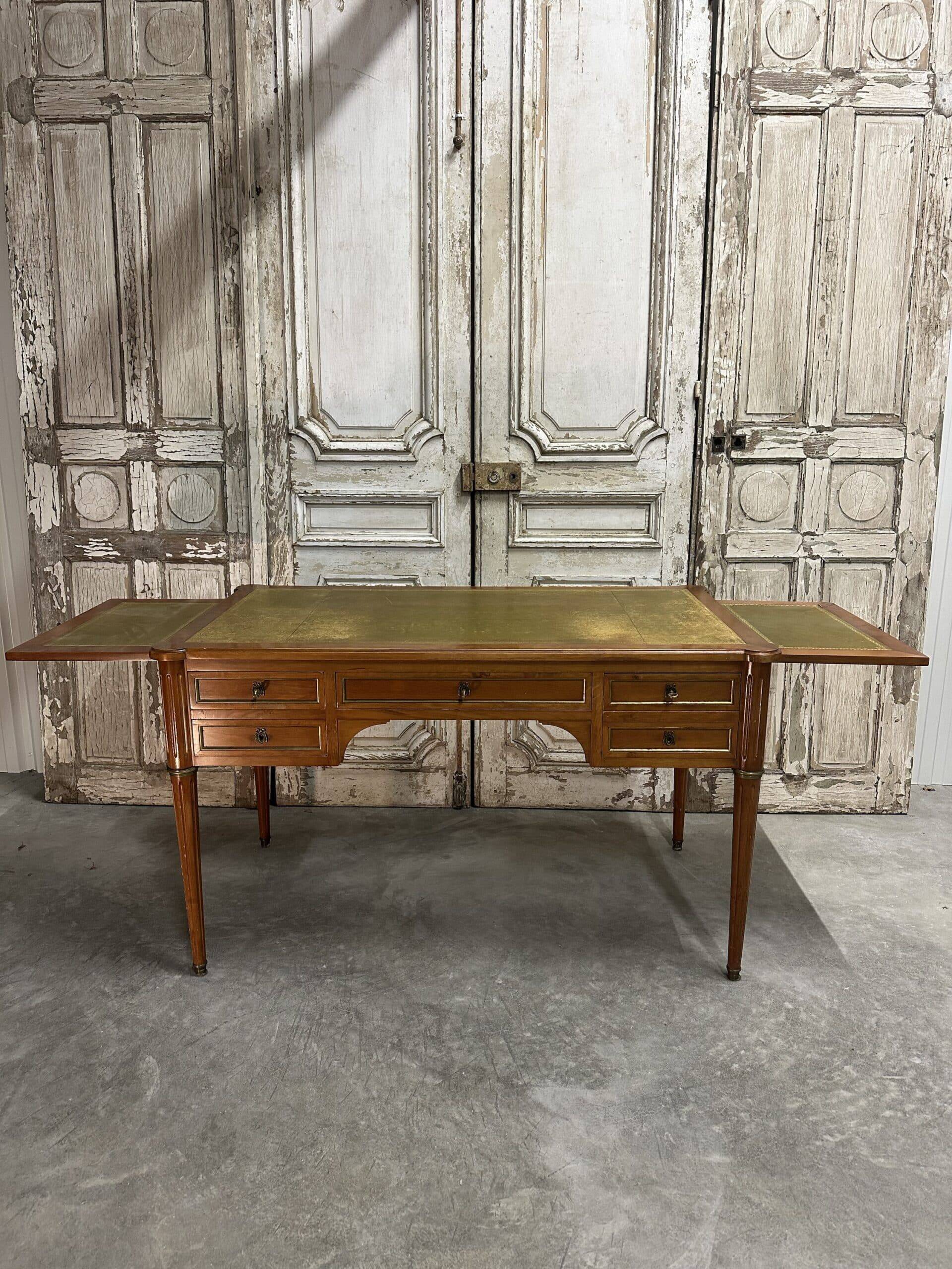 Louis XVI style flat desk in cherry wood from around 1960.