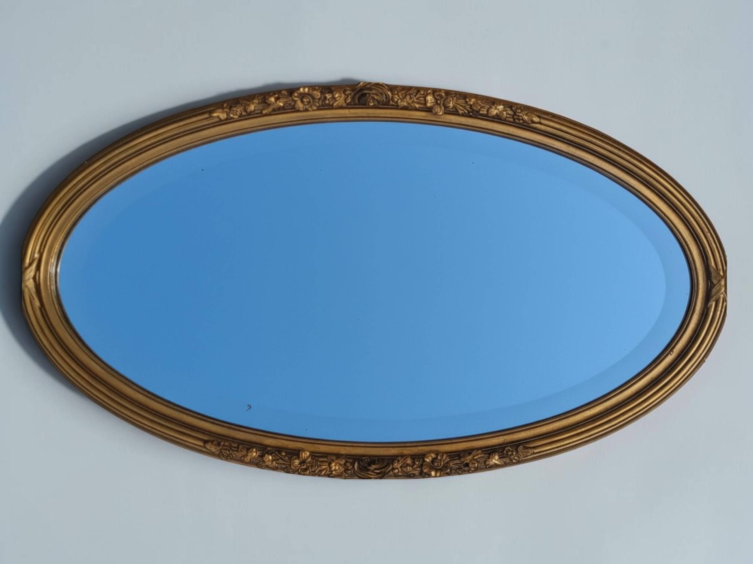 Miroir ovale en bois doré, style Louis XVI