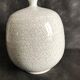 Vase boule à col pincé aplati
