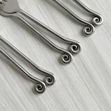 6 shiny metal cutlery sets