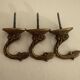 Description : Lot de 3 crochets muraux décoratifs en laiton au style a
