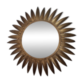 Large sun mirror in gilded metal. 1960