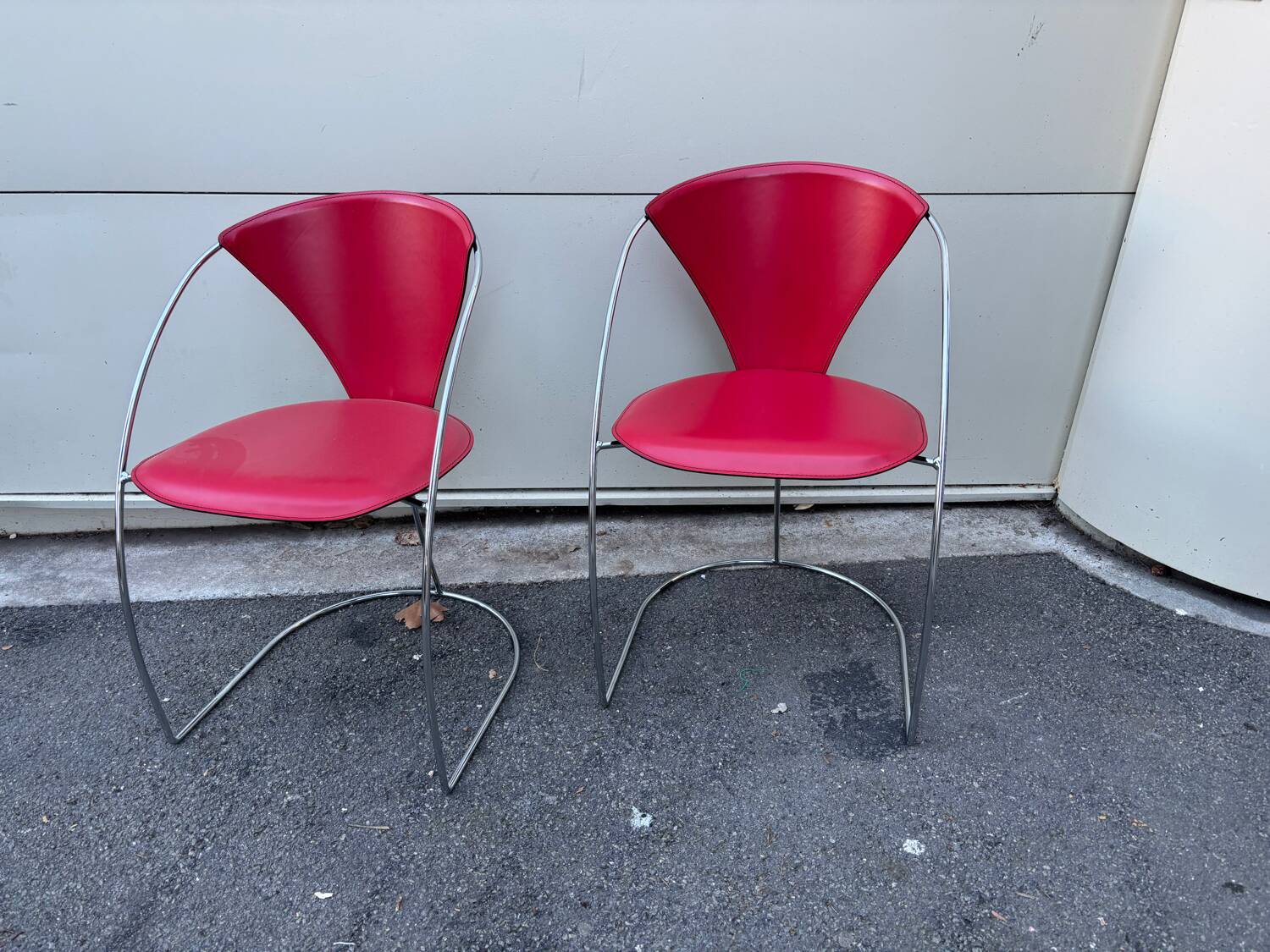 Pair of Linda chairs by Arrben in red leather