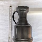 Pewter pitcher with handle and spout
