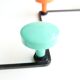 Old coat rack with 50s colored coat hooks