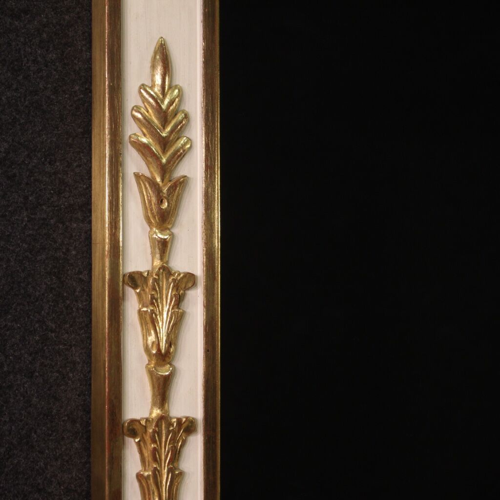 Lacquered and gilded mirror in Louis XVI style