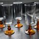 Champagne glasses with amber stems