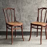 Pair of caned bistro chairs by Thonet