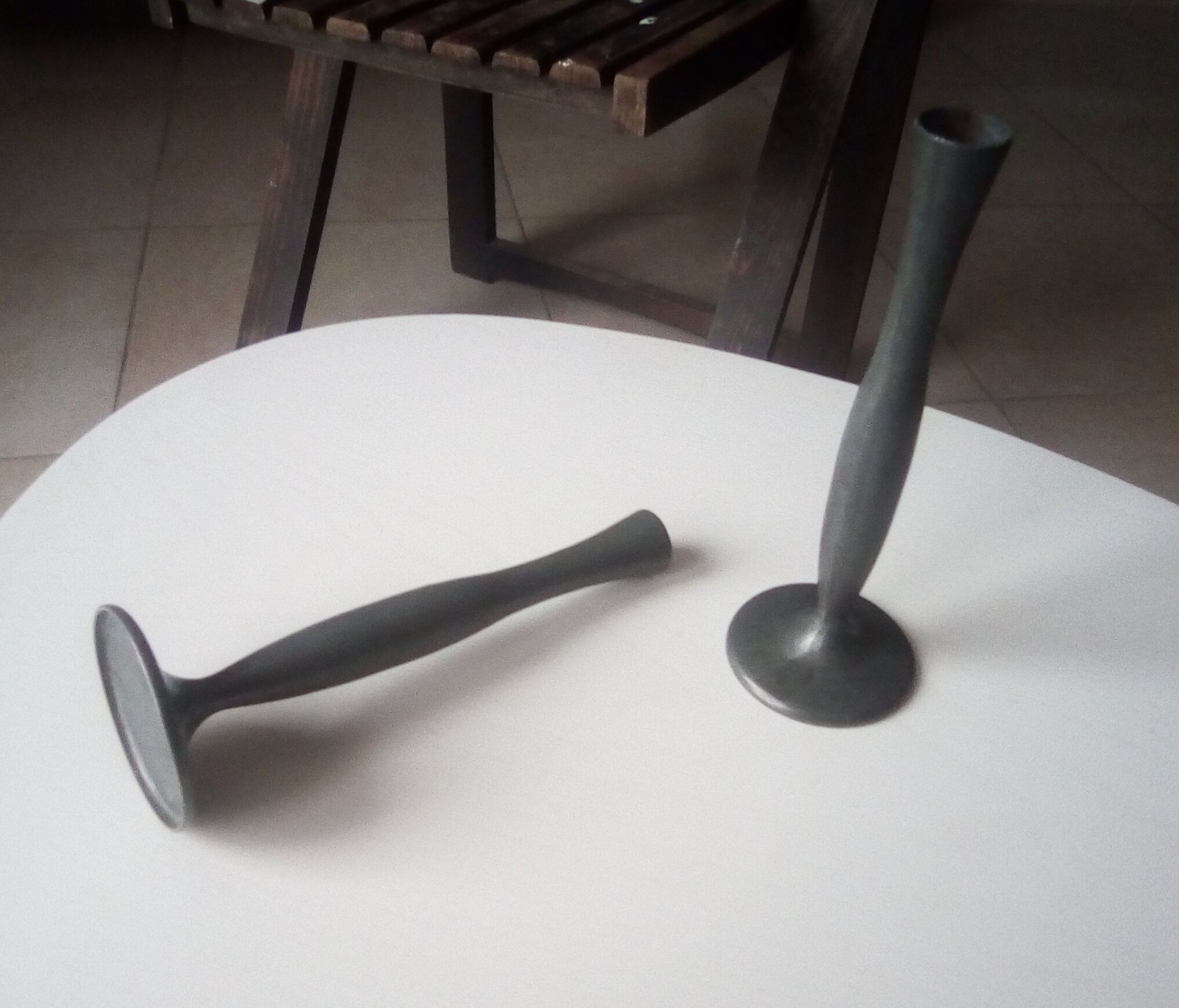 Pair of old tin candlesticks