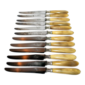 Series of 12 antique table knives in beige horn and steel blade 25cm
