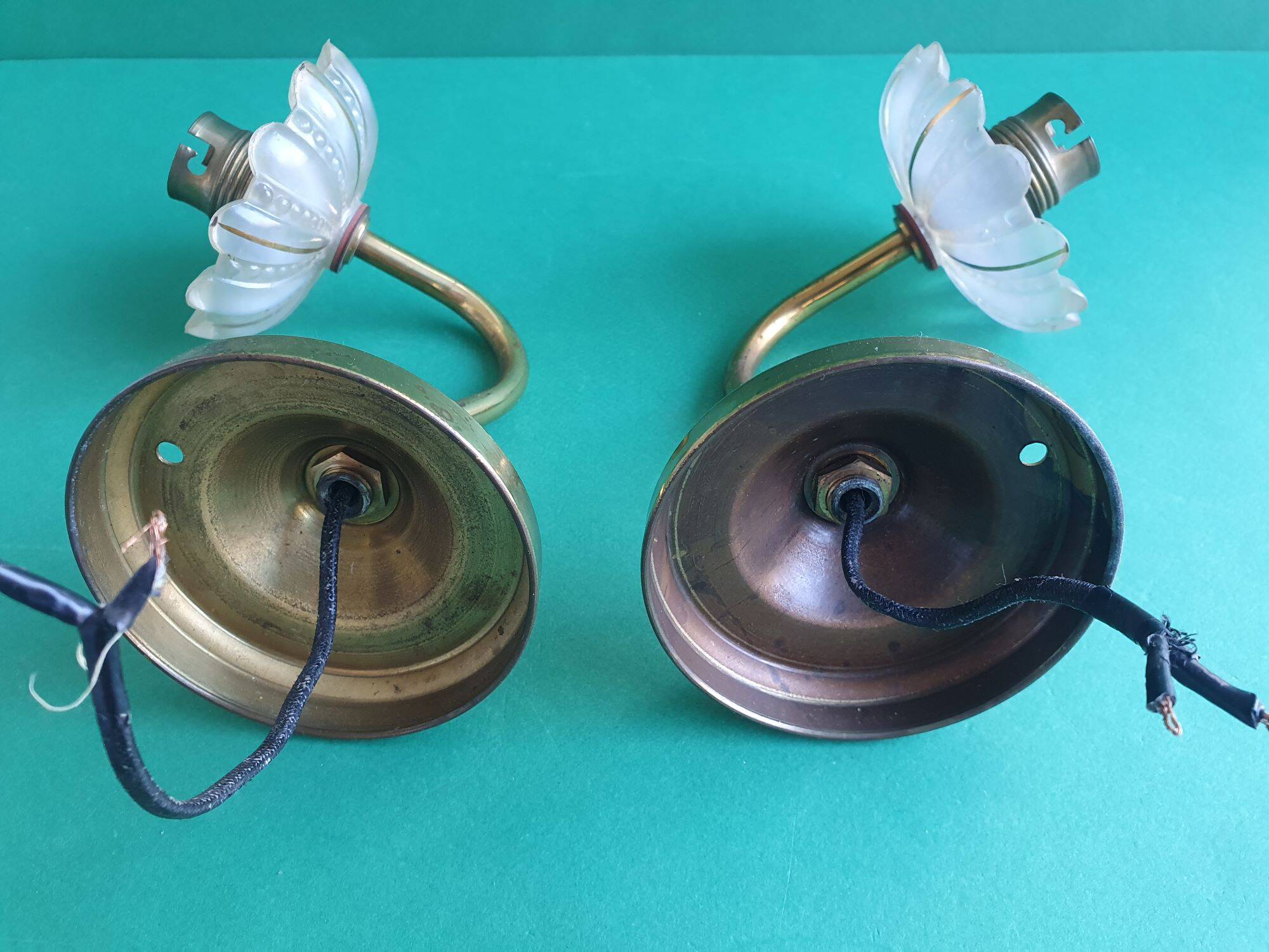 Pair of antique gold candlestick wall sconces