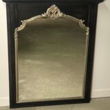 Trumeau mirror in black and silver patinated wood in Louis XV style