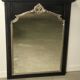 Miroir trumeau en bois noir et argenté patiné de style Louis XV