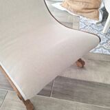 Vintage gondola armchair in beige linen fabric.