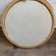 Vintage 1950s round wall mirror, wooden frame and mirror, yellow finish.