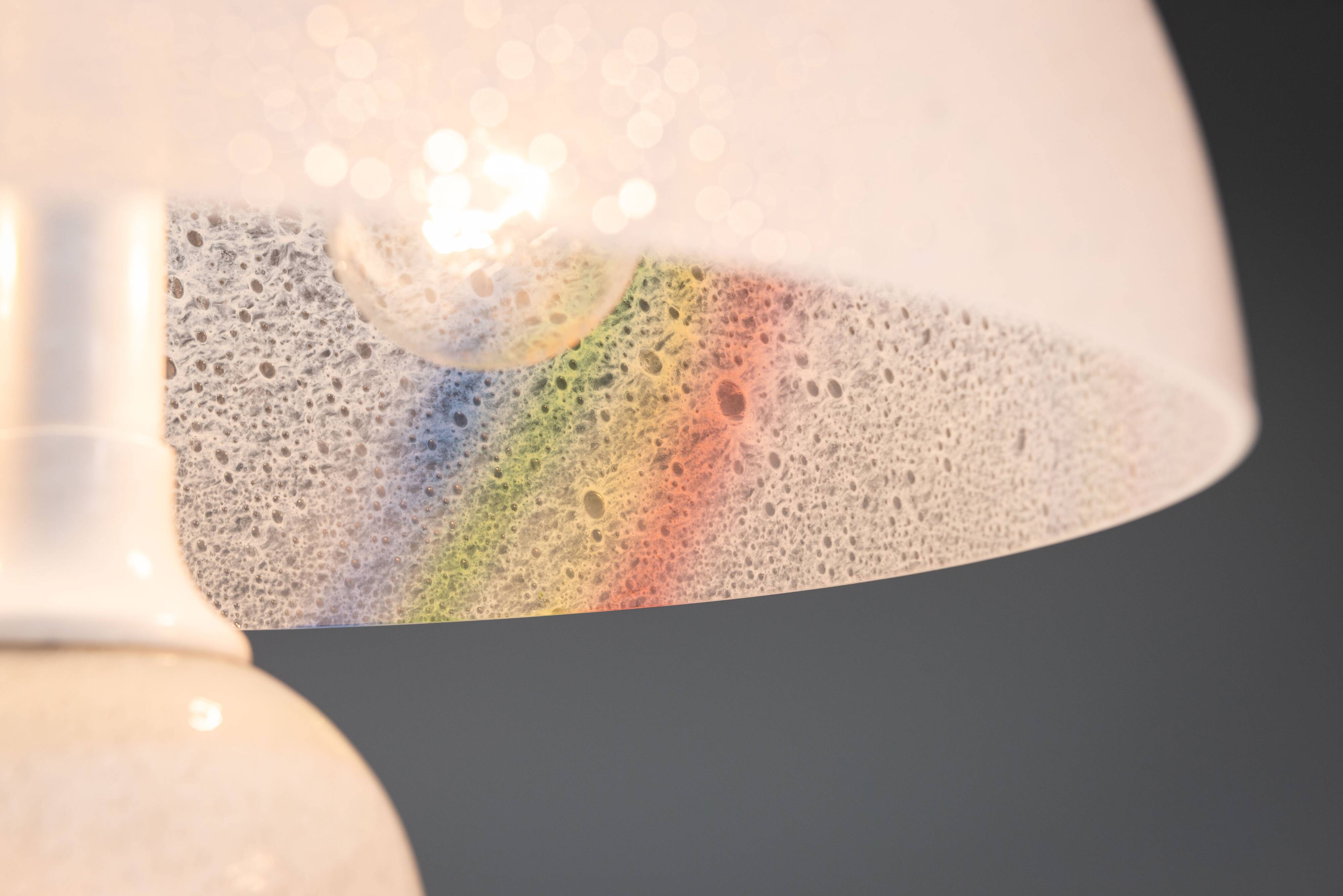 Doria table lamp in bubble glass with rainbow coloured details