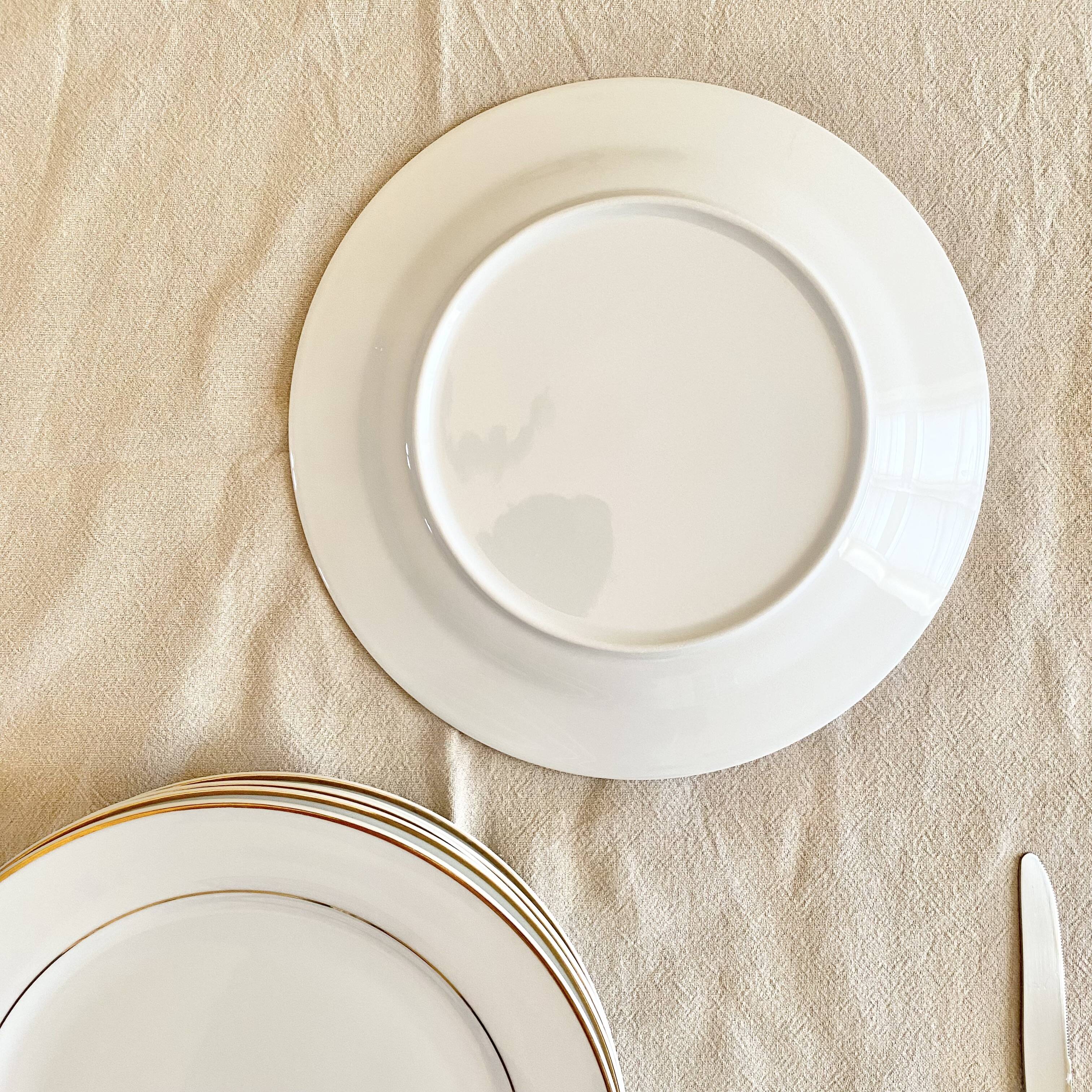 White and gold porcelain dinner plates