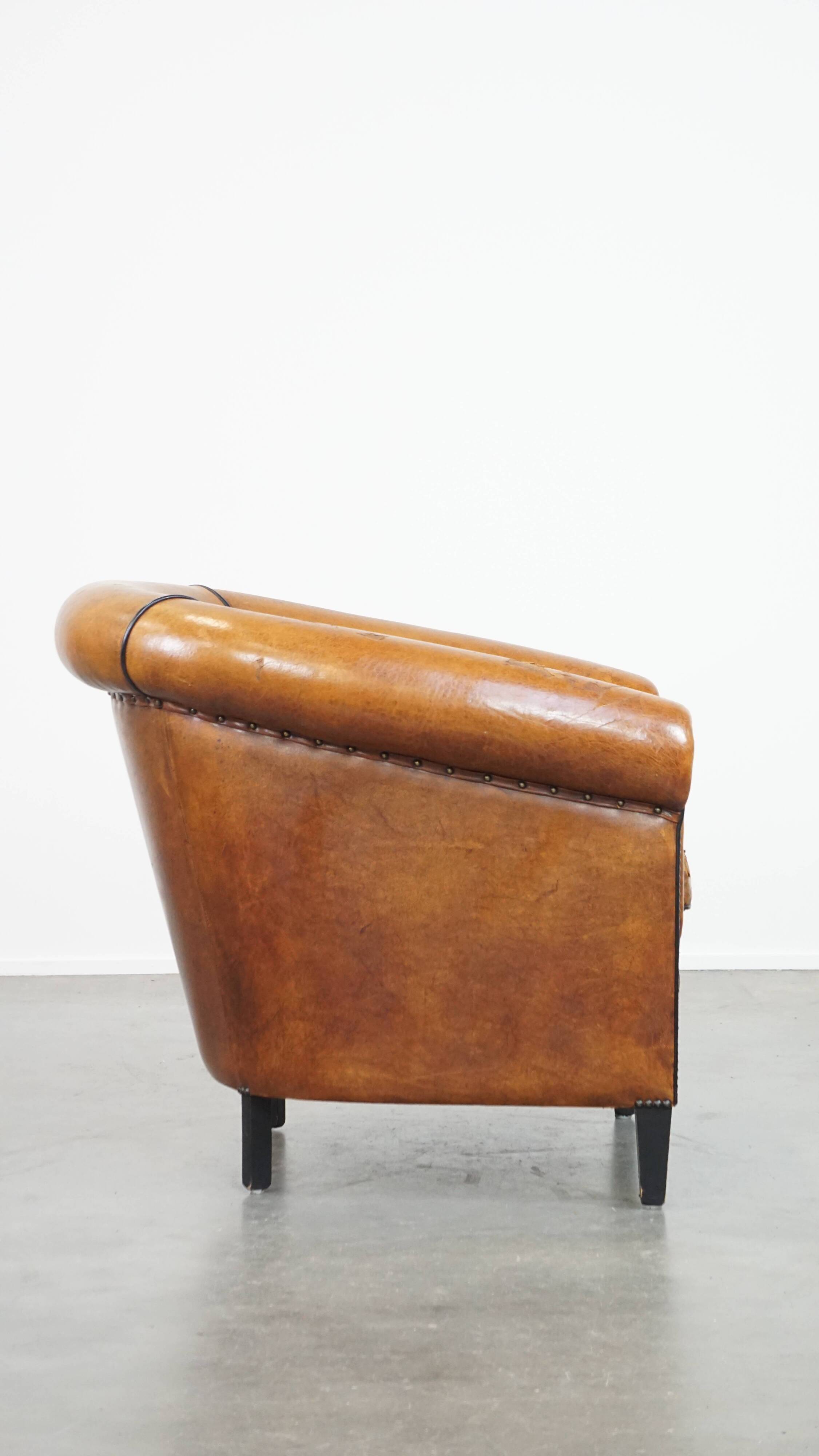 Sheep leather club chair with patina