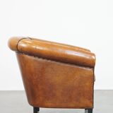 Sheep leather club chair with patina
