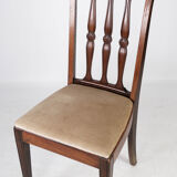 Set of four dining room chairs in rosewood and upholstered with light fabric, 1920s