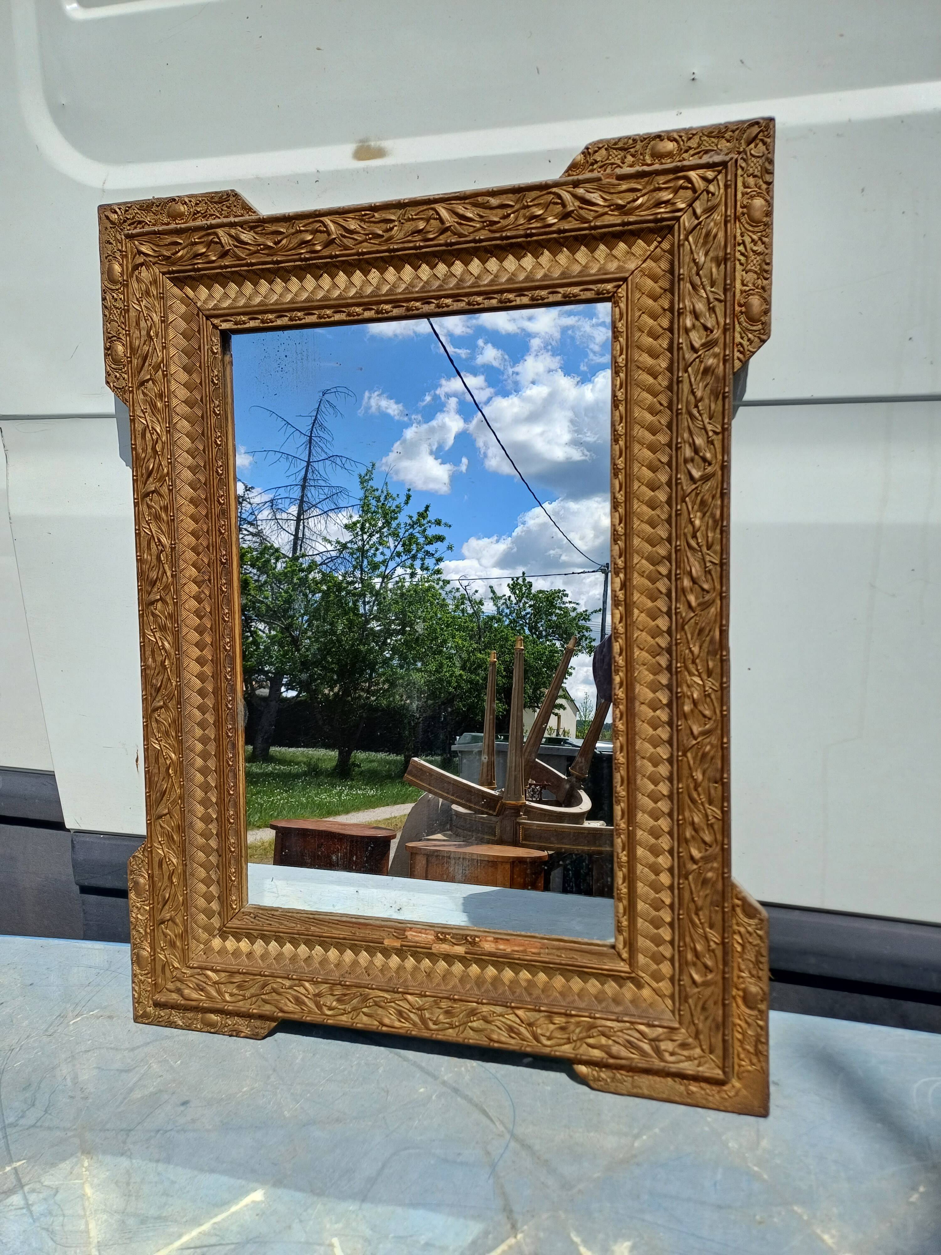 Wood and gilded Stuk mirror 19th