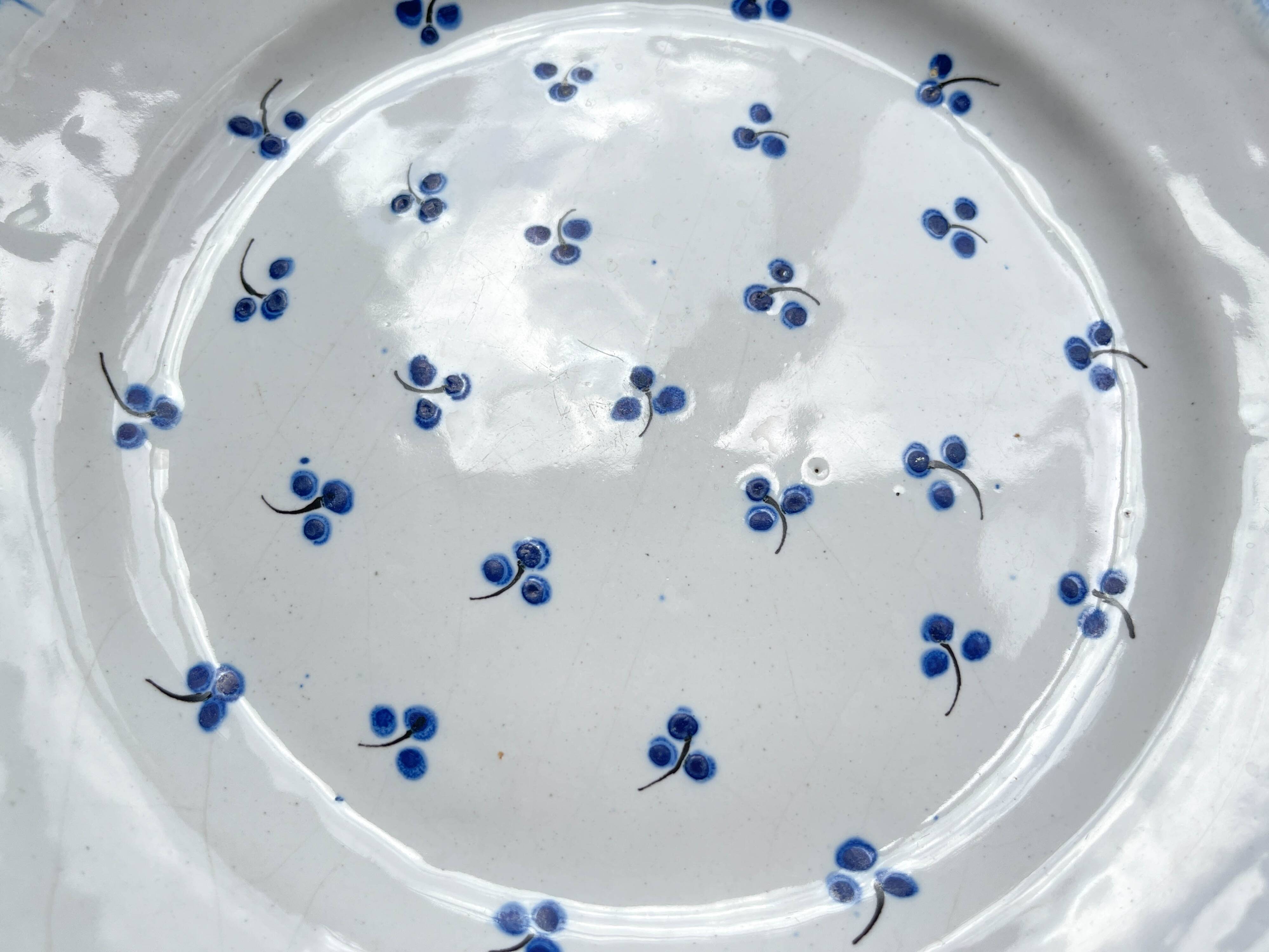 Antique French Earthenware Plate from the 19th century with small blue flower motif