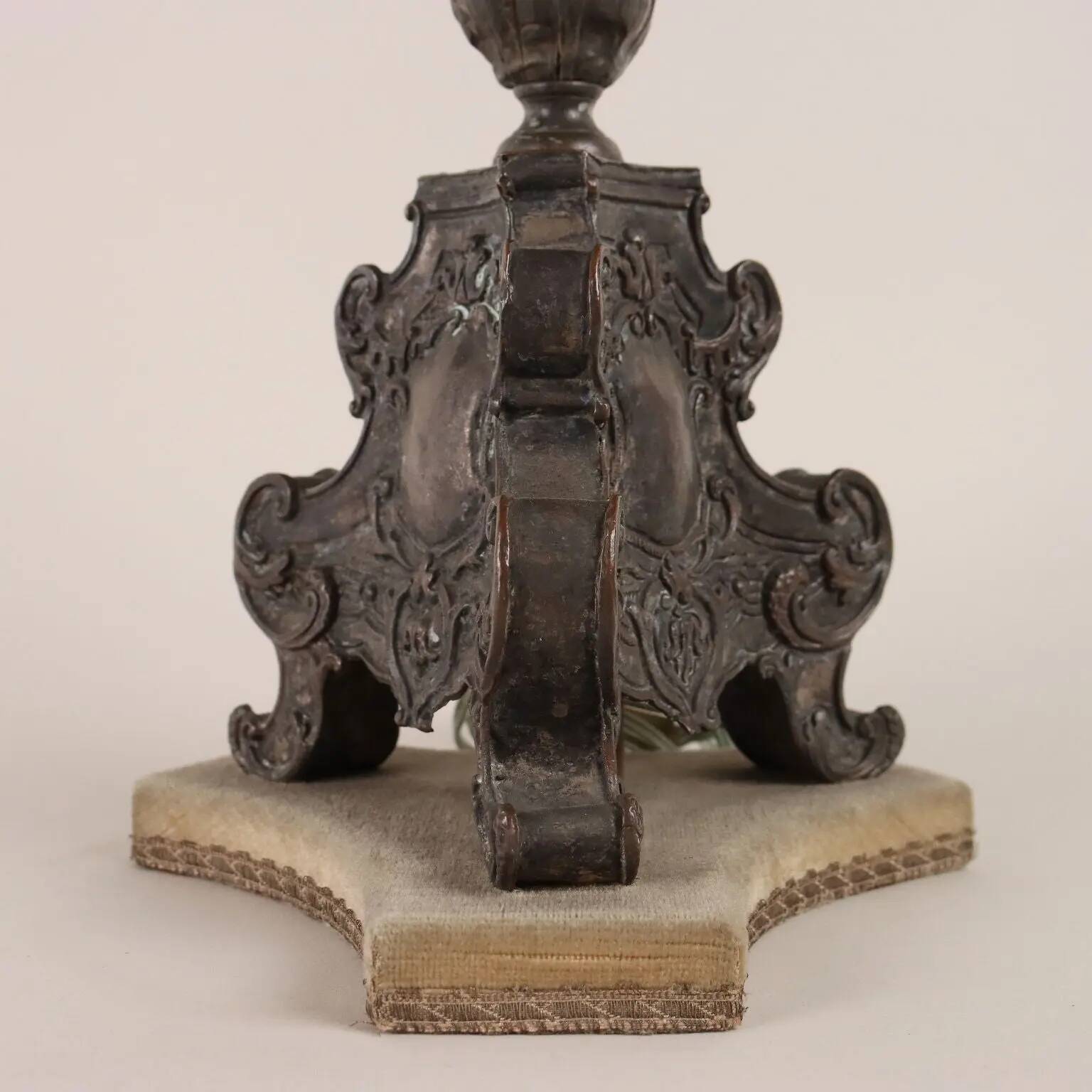Antique candelabrum converted into a lamp, 18th-19th century.