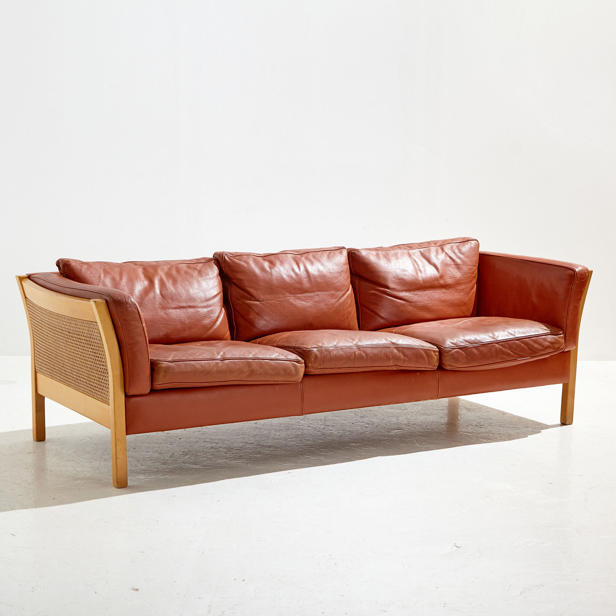 Three-seater leather sofa
