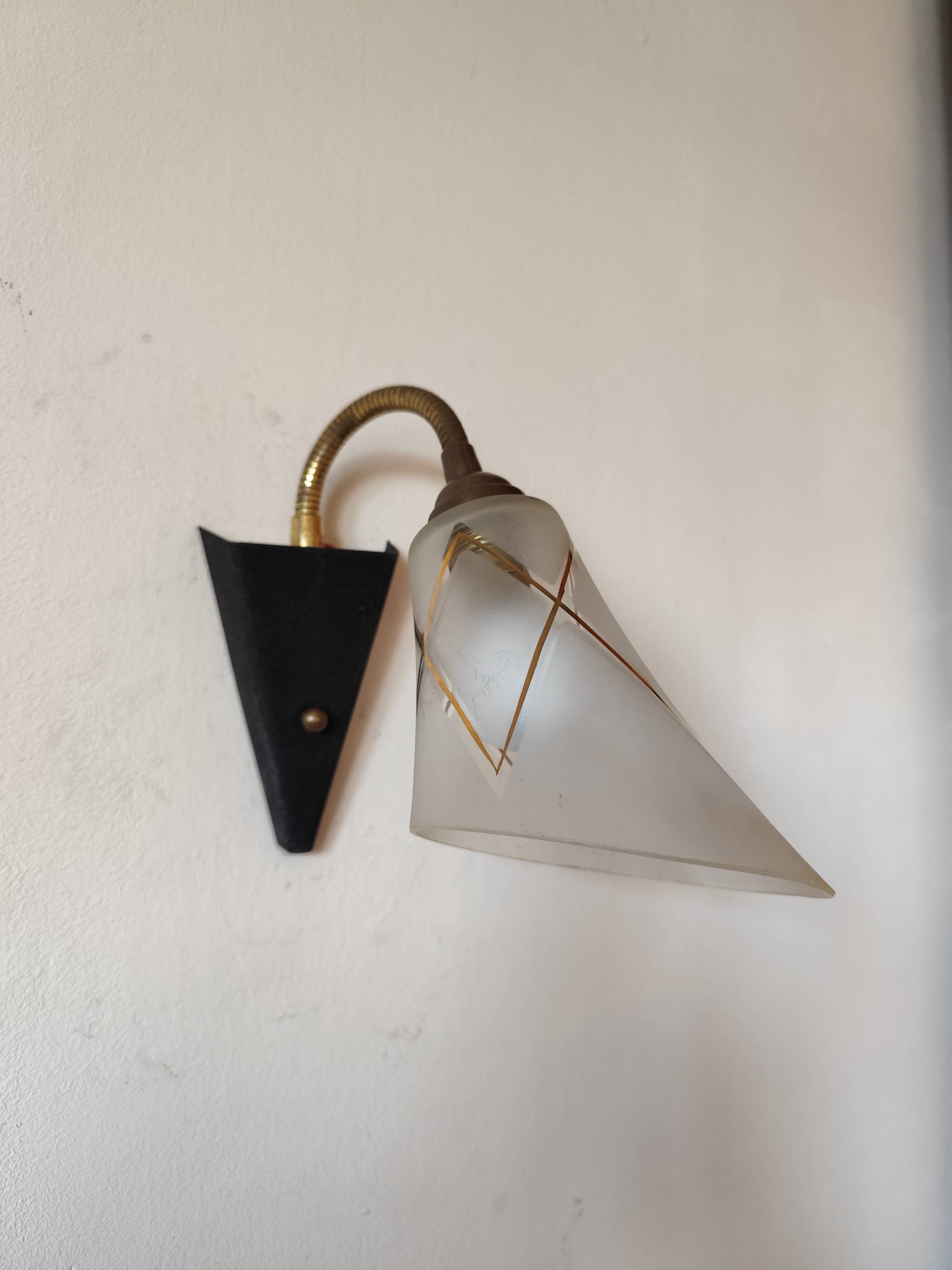 1950s wall lamp, metal, flexible brass stem and opaque shade.