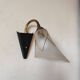 1950s wall lamp, metal, flexible brass stem and opaque shade.