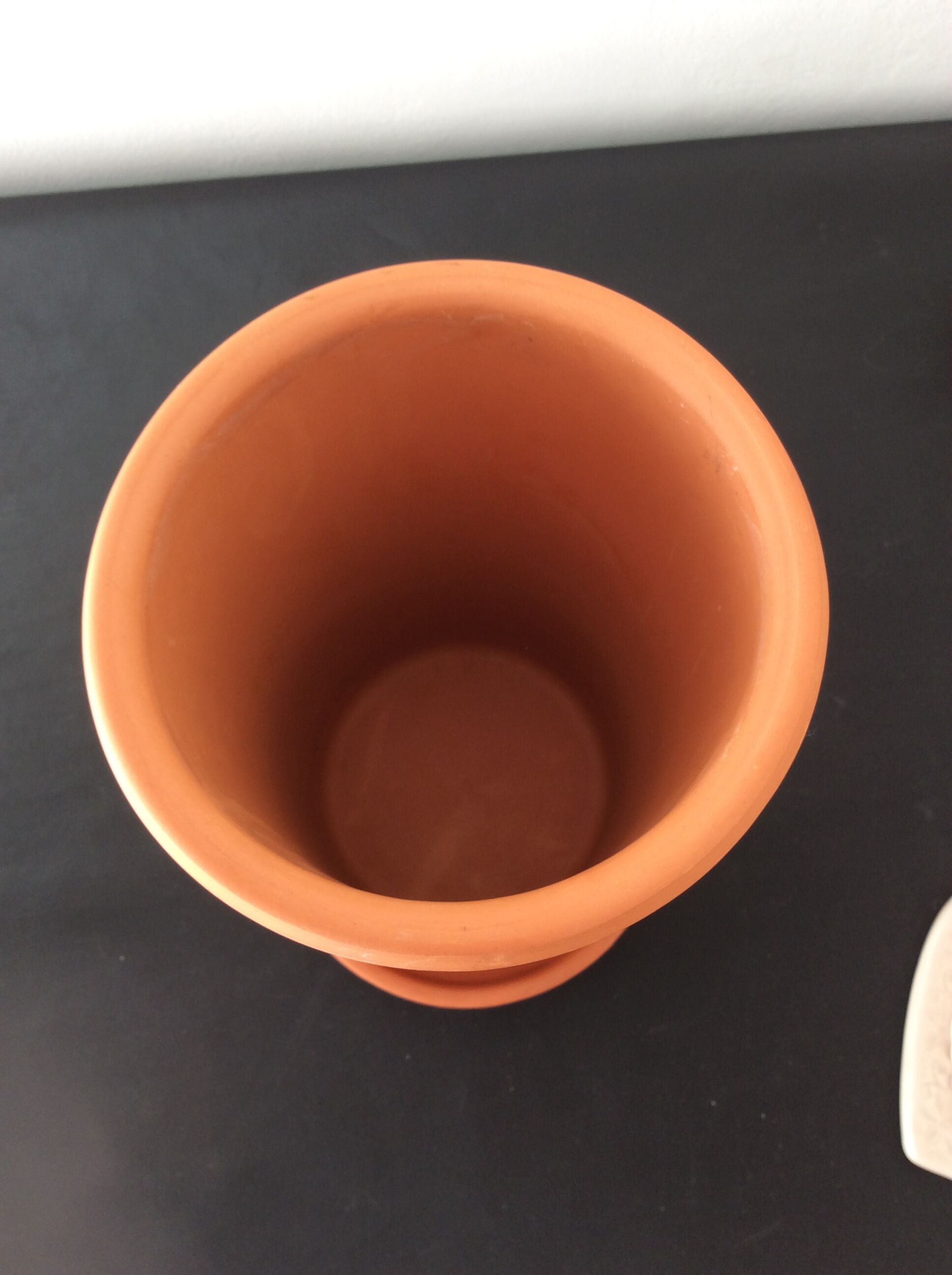 Wine cooler with terracotta saucer