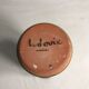 Roll former enamelled terracotta vase signed Ludovic