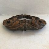Ancient mirror in carved wood, vintage decoration