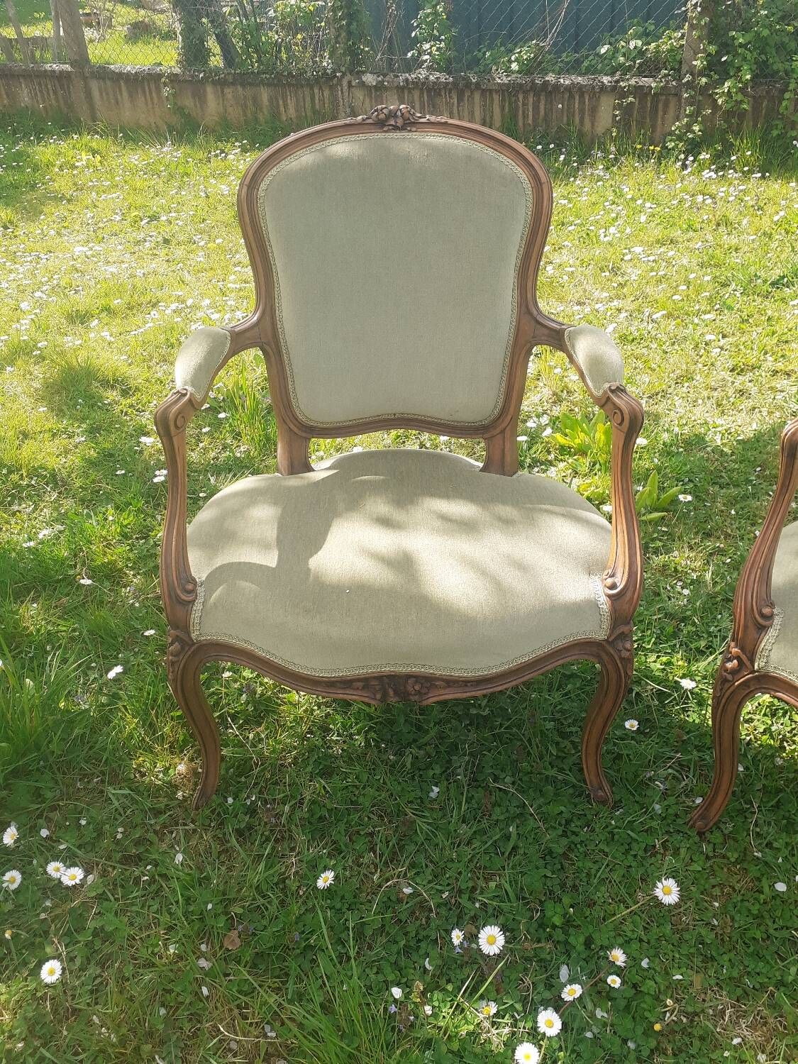 Pair of Rocaille style armchairs in green fabric and walnut, 19th century